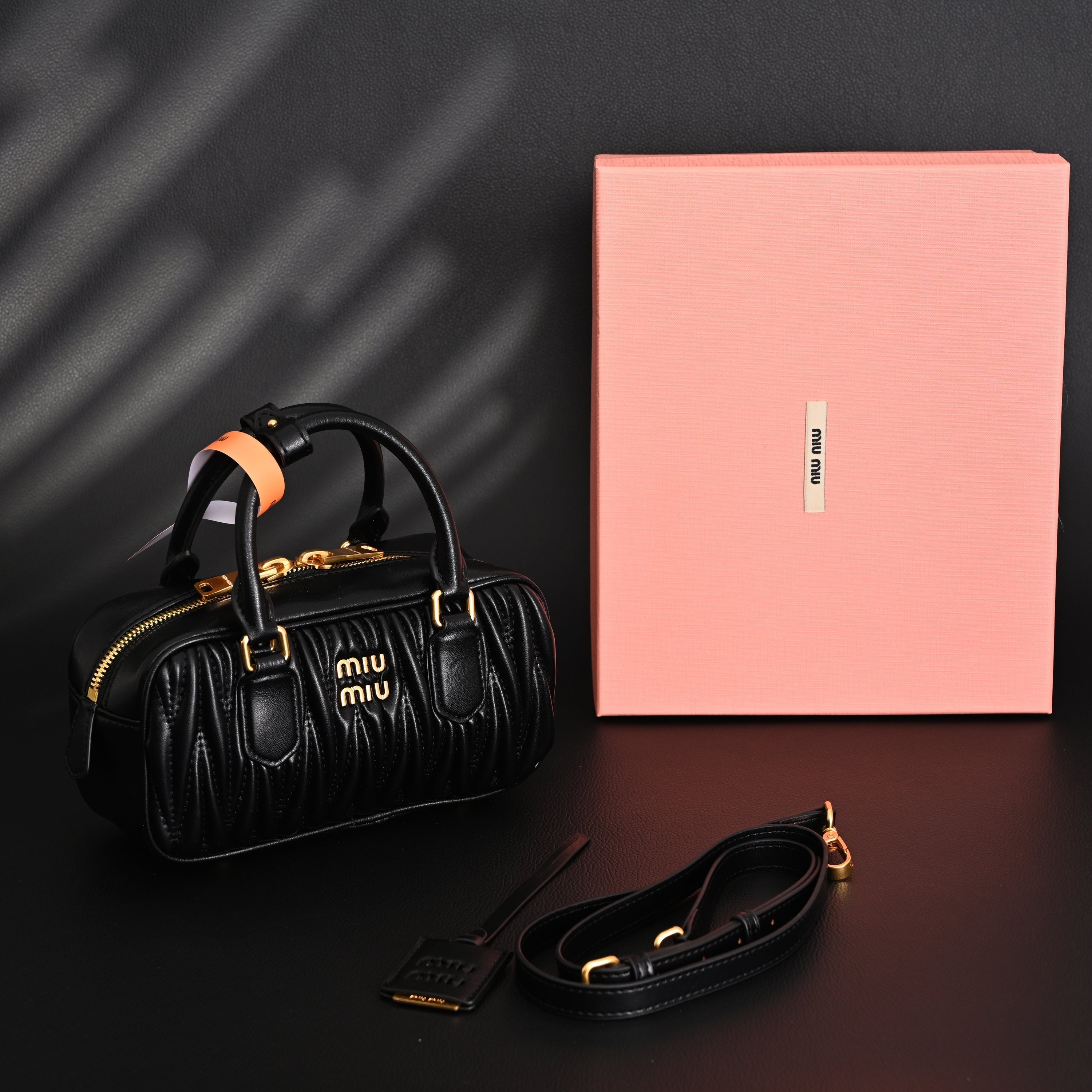 Miu Miu Black Matelassé Leather Top Handle Bag