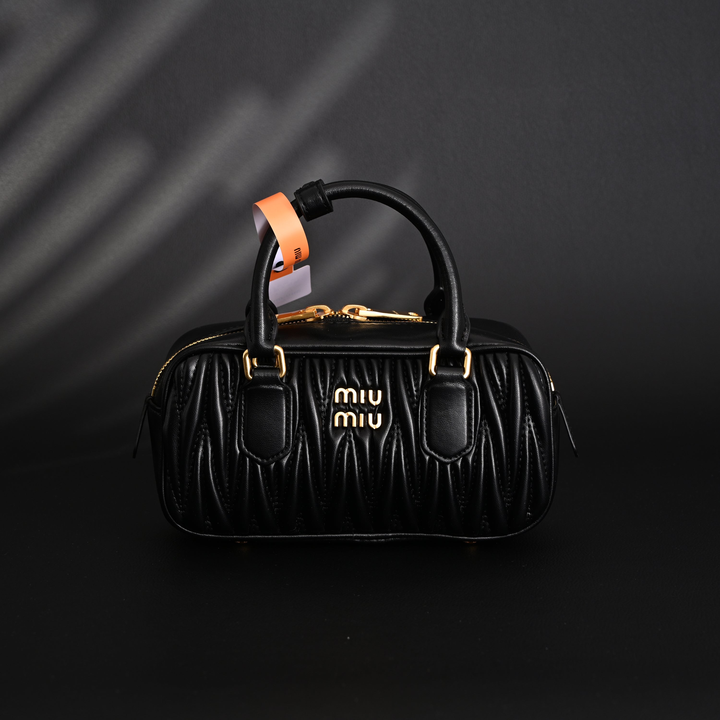 Miu Miu Black Matelassé Leather Top Handle Bag