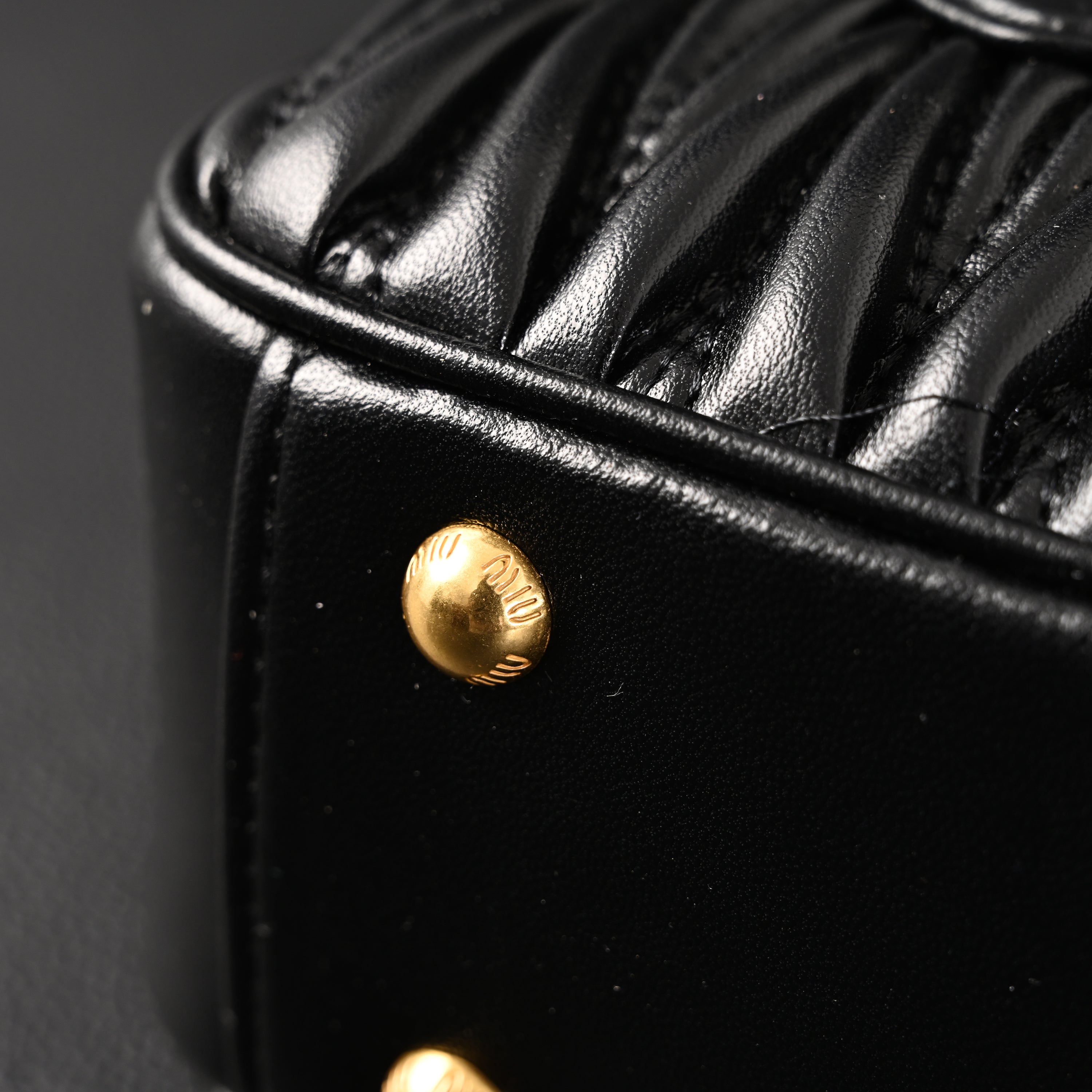 Miu Miu Black Matelassé Leather Top Handle Bag