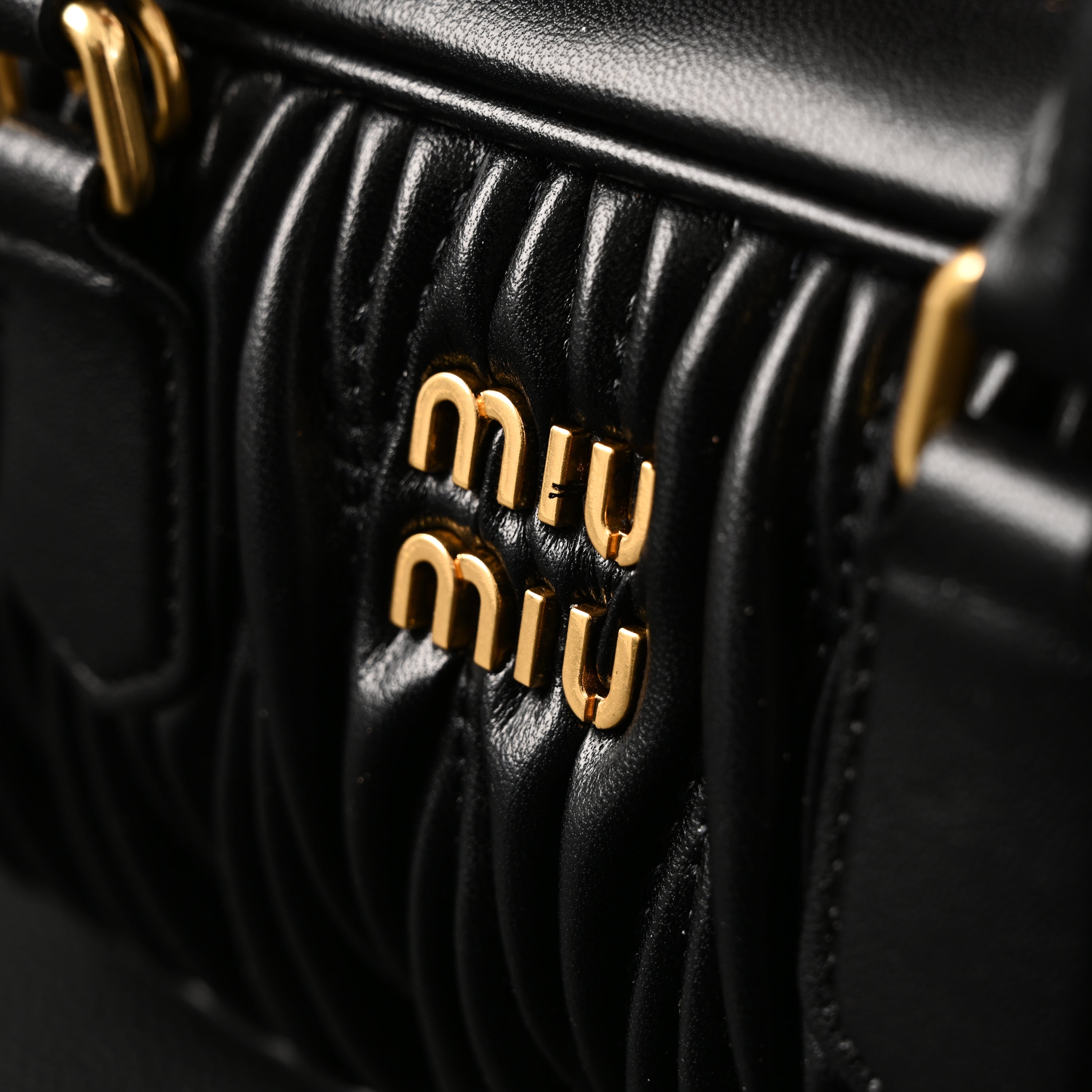 Miu Miu Black Matelassé Leather Top Handle Bag