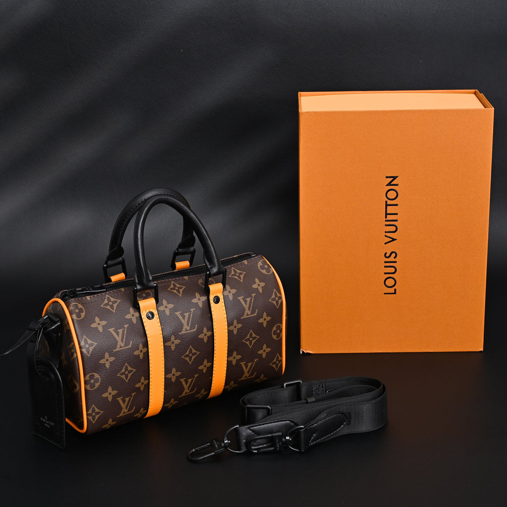 Louis Vuitton Keepall Bandoulière 50 – Monogram Canvas with Neon Orange Trim