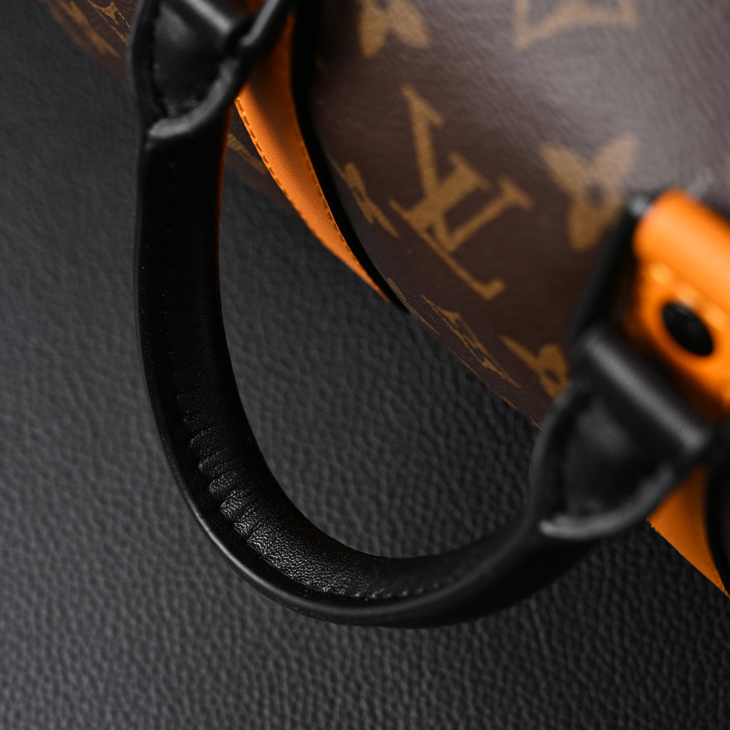 Louis Vuitton Keepall Bandoulière 50 – Monogram Canvas with Neon Orange Trim
