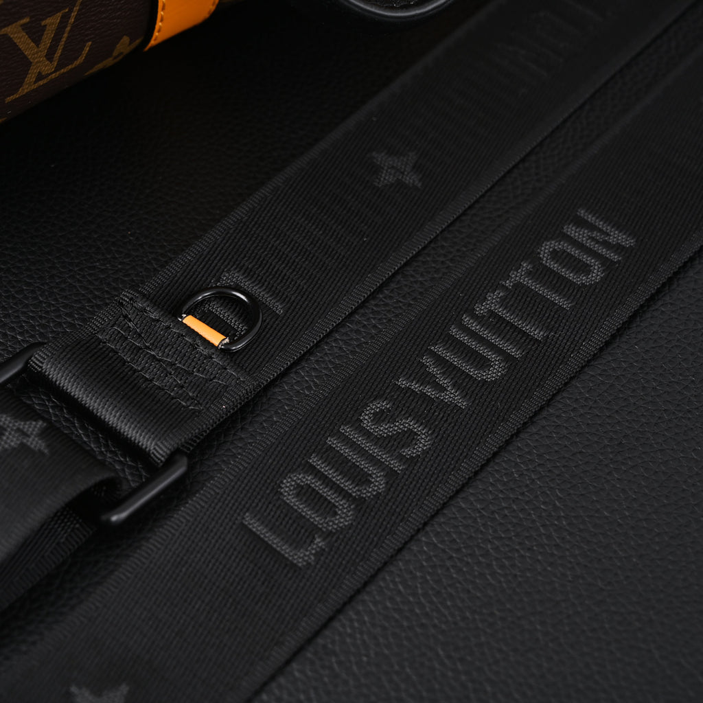 Louis Vuitton Keepall Bandoulière 50 – Monogram Canvas with Neon Orange Trim