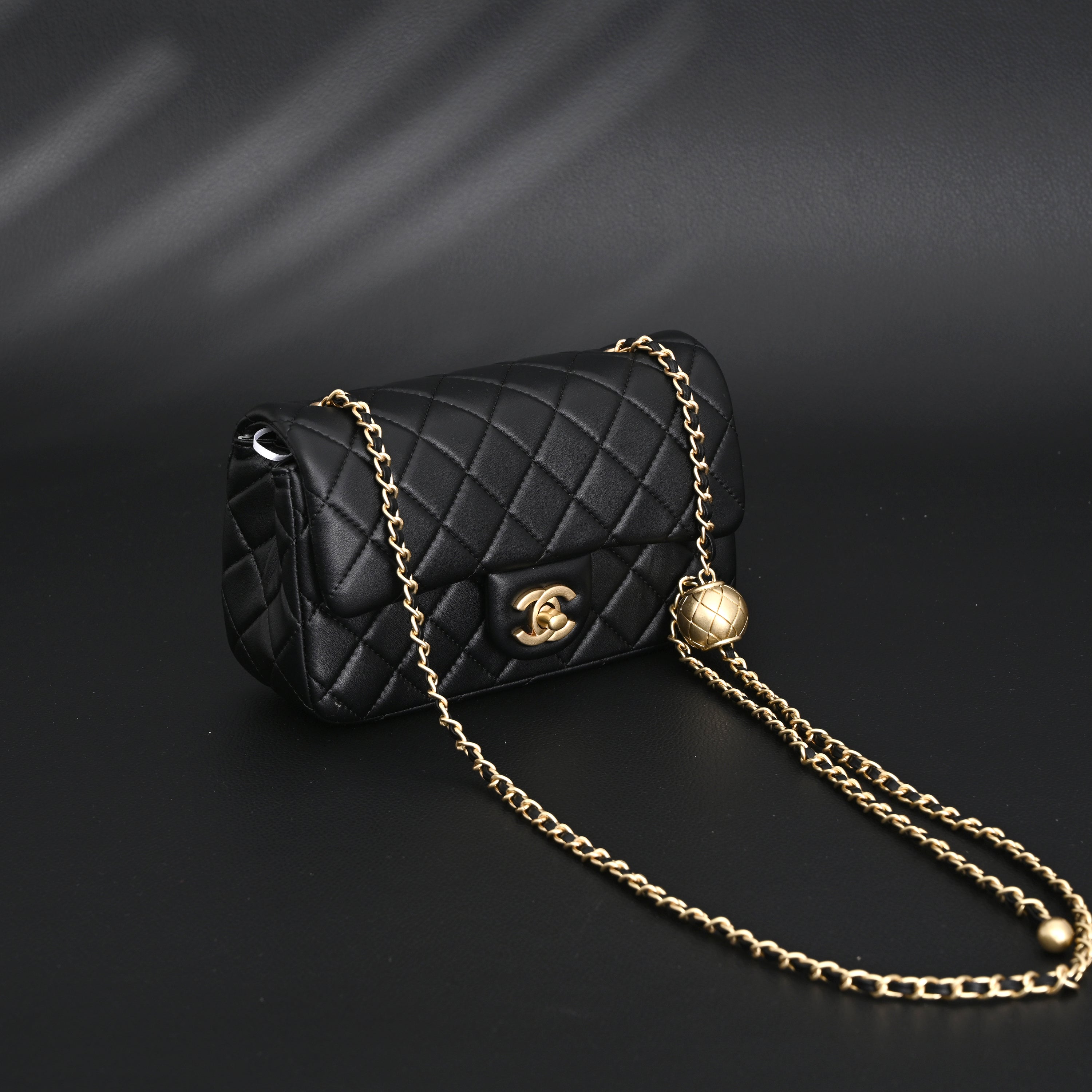 Chanel Classic Flap Mini Bag – Black Quilted Lambskin with Gold-Tone Hardware