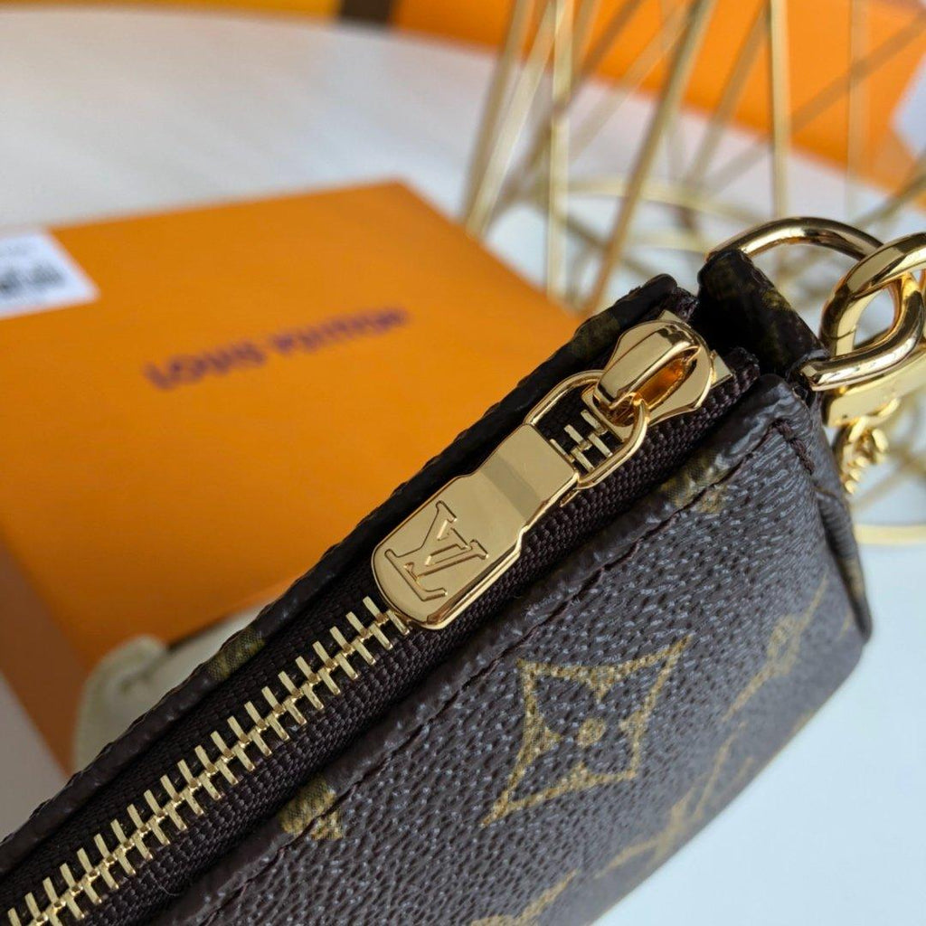 Louis Vuitton mini pochette accessoires on chain Monogram